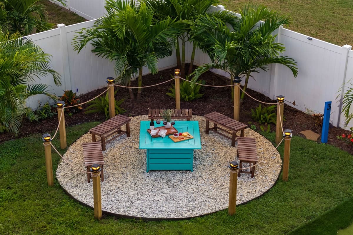 Surrounded by palm trees and soft lighting, perfect for evening drinks.