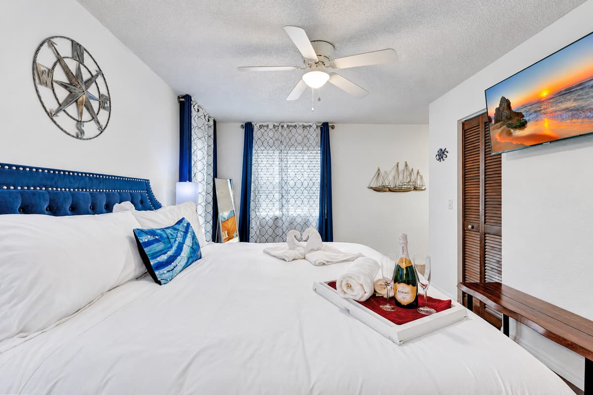 At the heart of this bedroom is a lavish king-size bed, inviting you to indulge in unparalleled comfort.