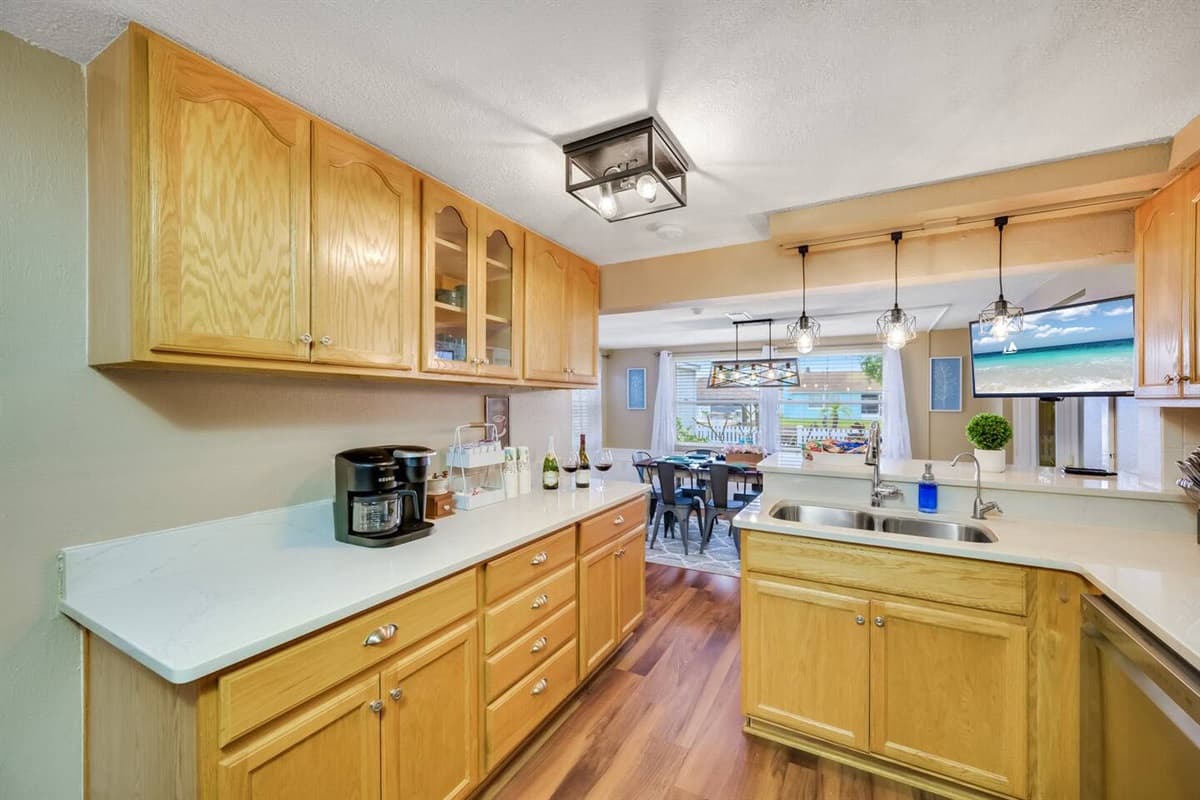 Our spacious kitchen has a lot of storage too! It's equipped with a dishwasher and has a lot of cabinets and drawers for kitchen tools and utensils.
