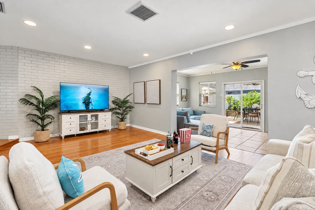 Catch up on your favorite shows on the smart TV or enjoy conversation in this beautifully designed open-concept living space.