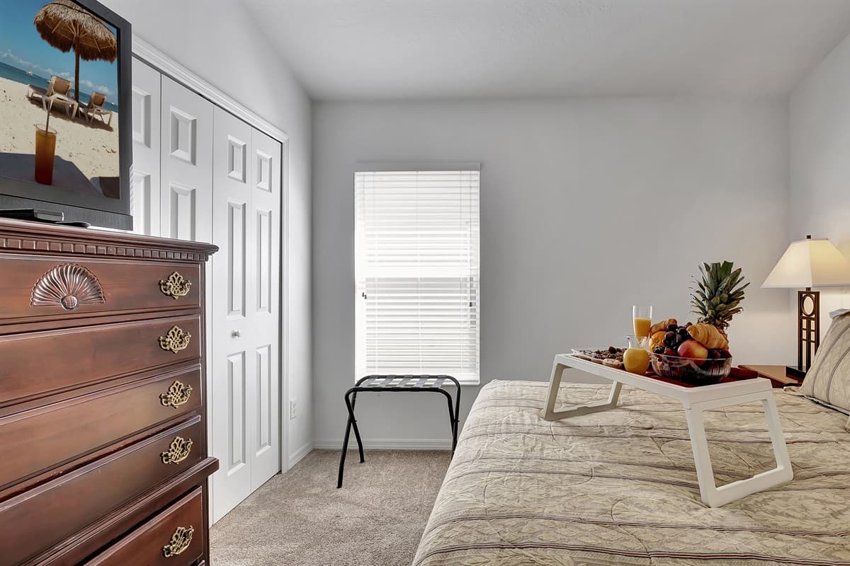 Dominating the room is a lavish queen-size bed, inviting you to surrender to a night of deep, uninterrupted slumber.