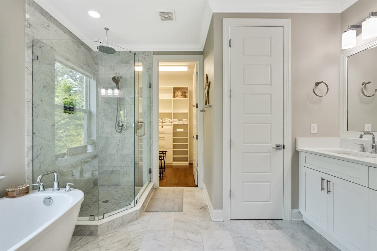 This full bathroom is designed to provide both practicality and indulgence, offering a serene oasis for your daily routines.