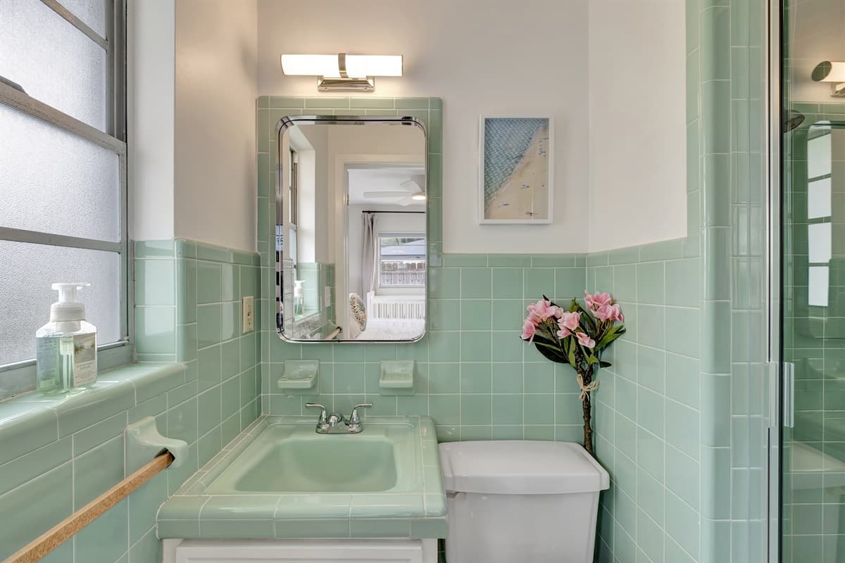 Enter a peaceful haven of calmness, where you'll find either a comforting shower or a leisurely, indulgent bath ready to rejuvenate your senses.