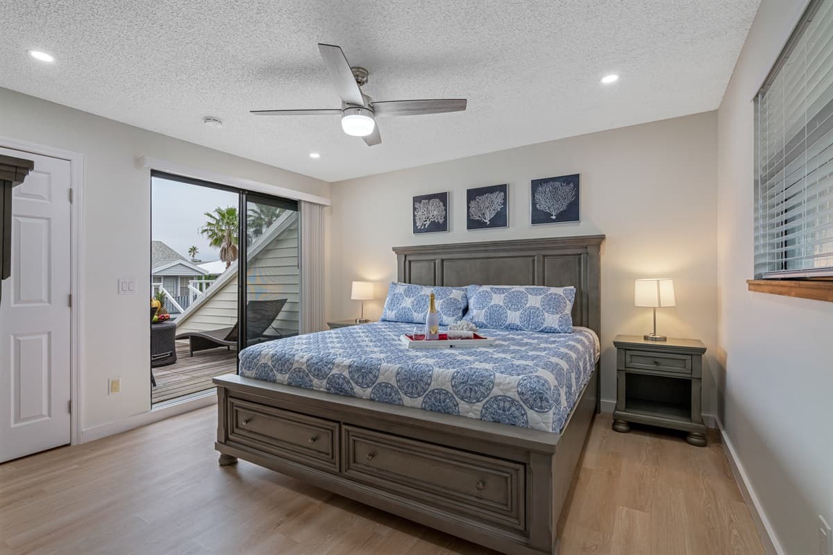 Welcome to our luxurious king-size bedroom with a stunning outdoor area that will take your breath away. Step into a world of comfort and elegance as you enter this spacious retreat fit for royalty.