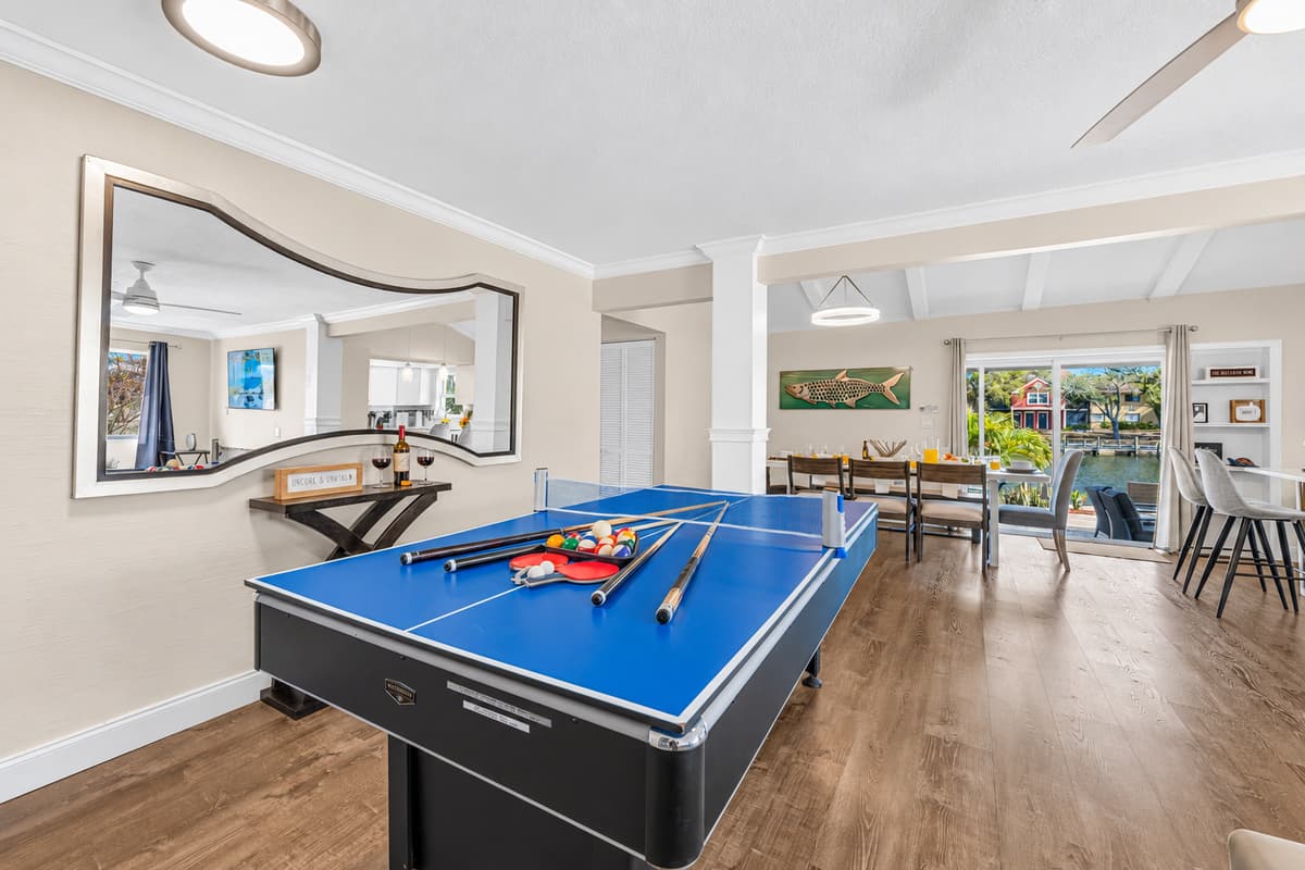 Game room with pool table overlooking the dining area—great for entertaining all ages.