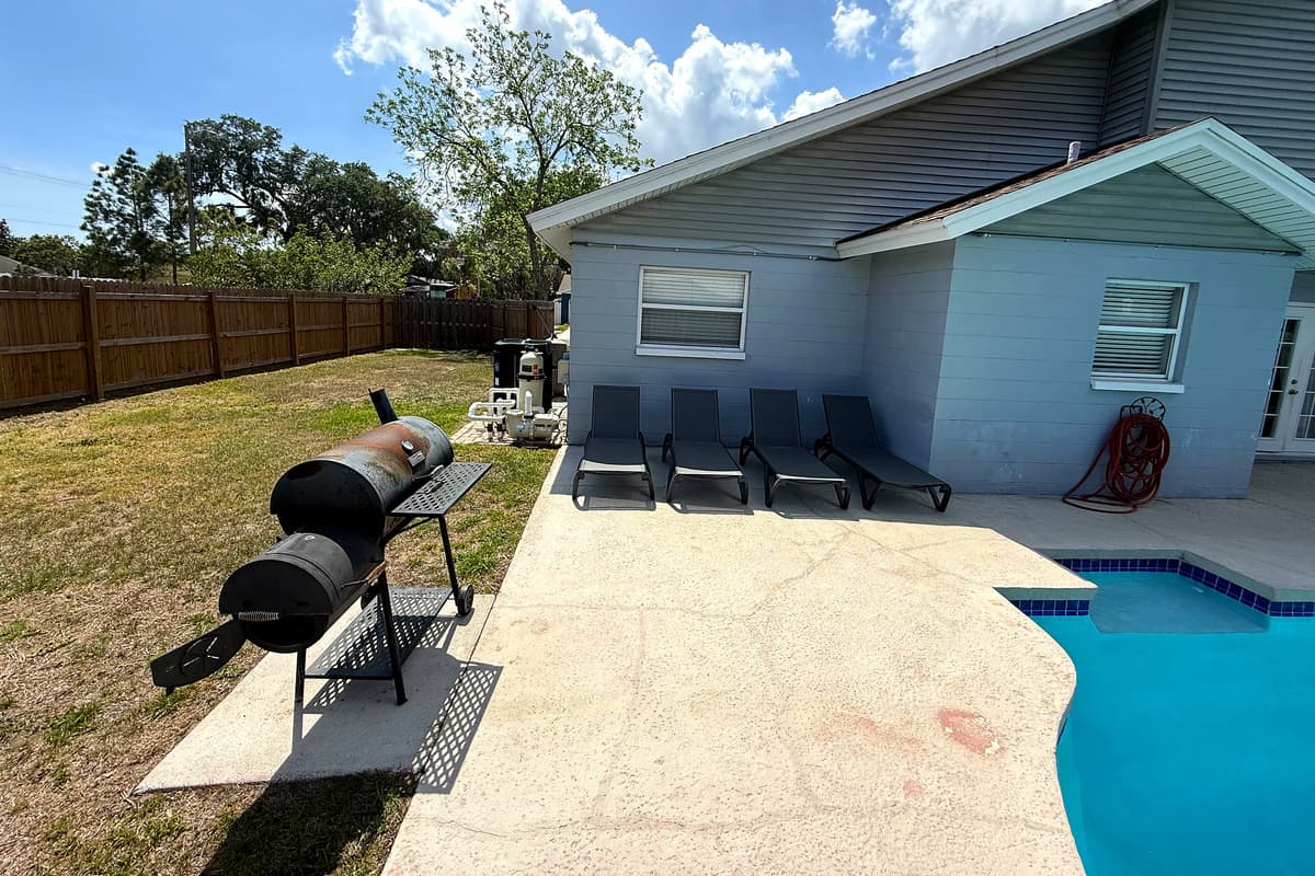 Fire up the BBQ grill and enjoy a delicious cookout with loved ones in this outdoor paradise.