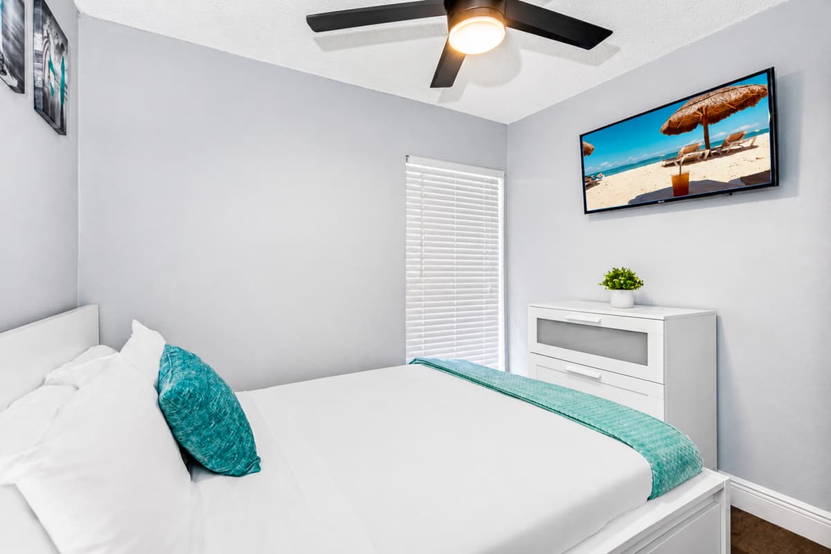 This lovely room has a queen-size bed, drawers, and its own TV. Who wouldn't want a comfortable room to rest in after a long day at the beach? If you like what you see so far, send us a messag