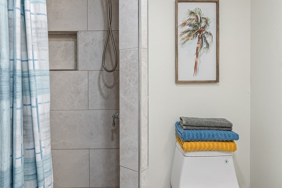 This bathroom features a modern toilet that emphasizes comfort and cleanliness.