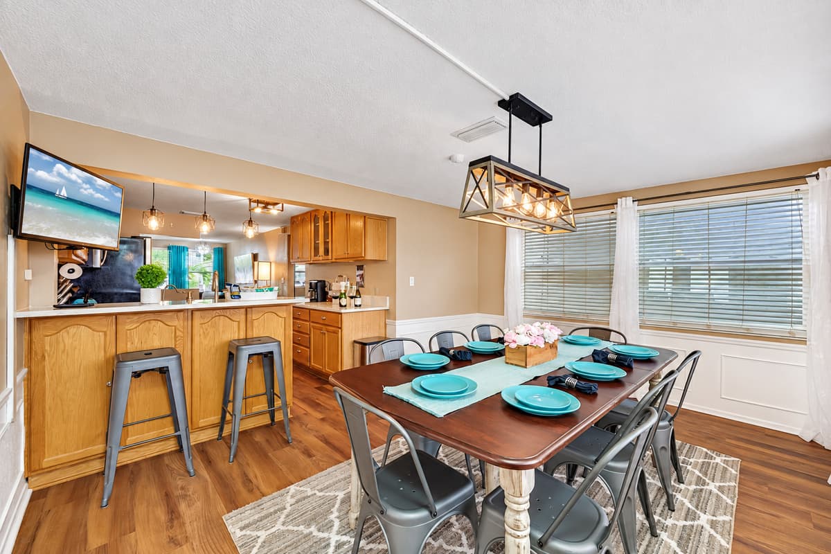 This open concept of our beautiful dining area and modern fully equipped kitchen  is perfect for you and your group. Cherish this time with family and friends while on vacation. 