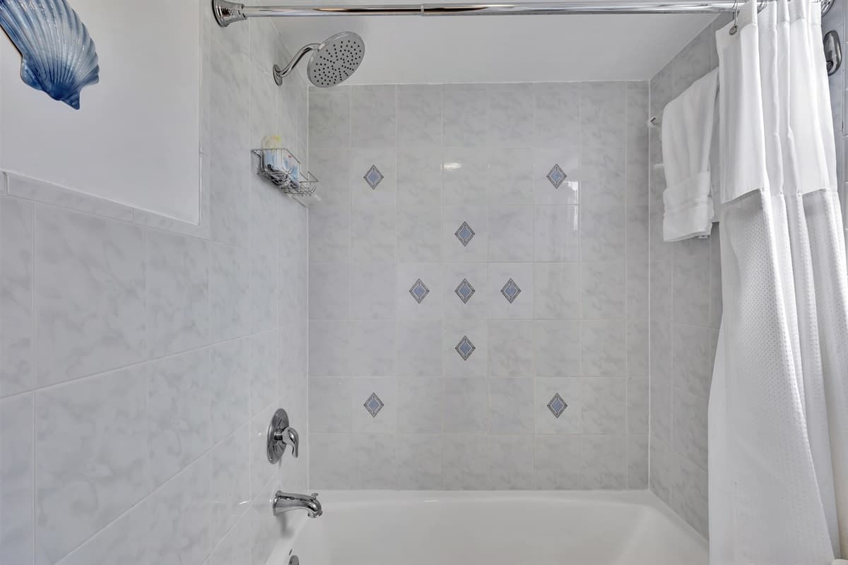 This bathroom is designed to be a practical and efficient space, ensuring that all your basic needs are met with ease and style.