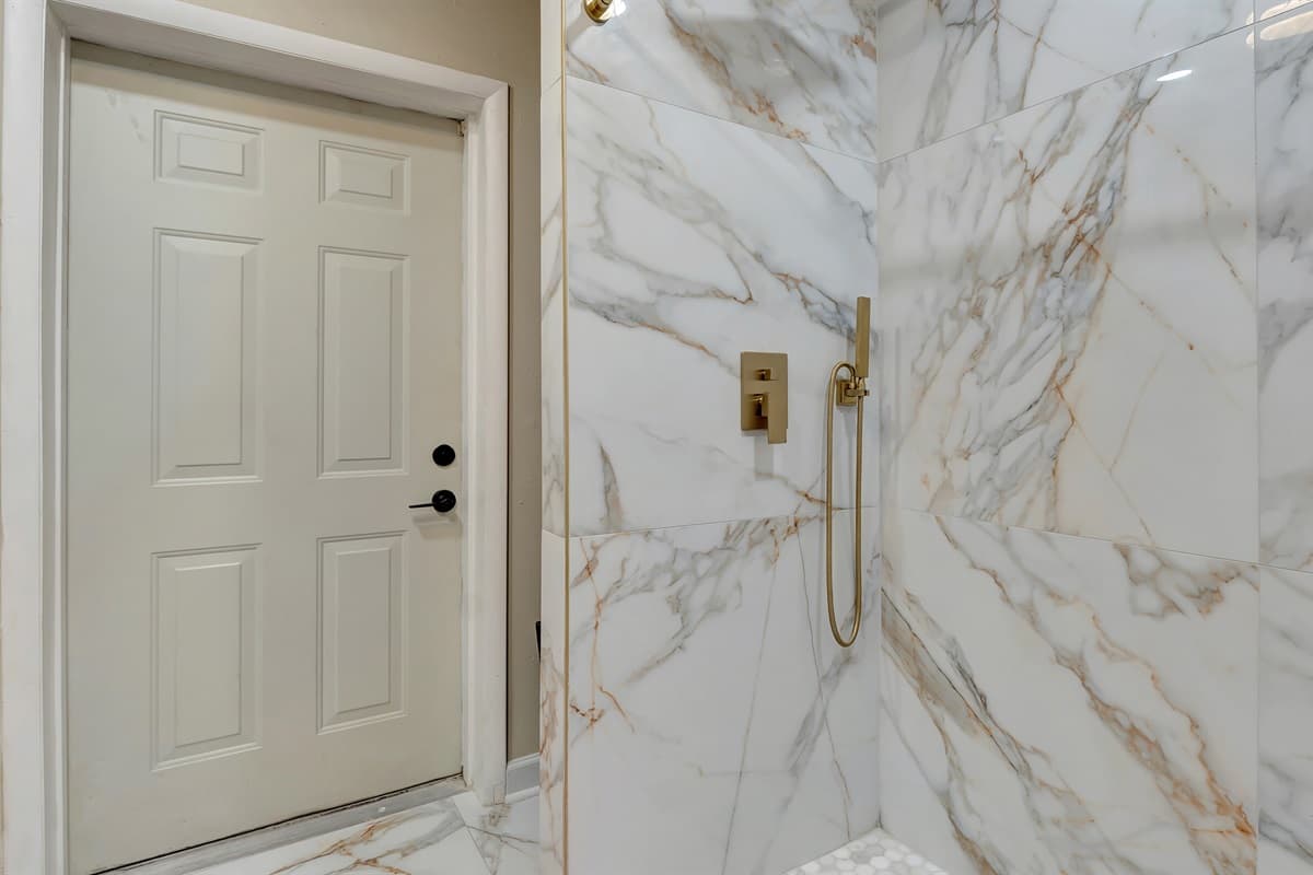 Indulge in opulence in our bathroom retreat, where timeless elegance meets modern comfort.