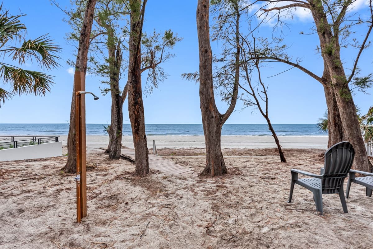 A short walk from your doorstep, you'll find the pristine beach, where soft sand and the soothing sound of waves crashing invite you to unwind.