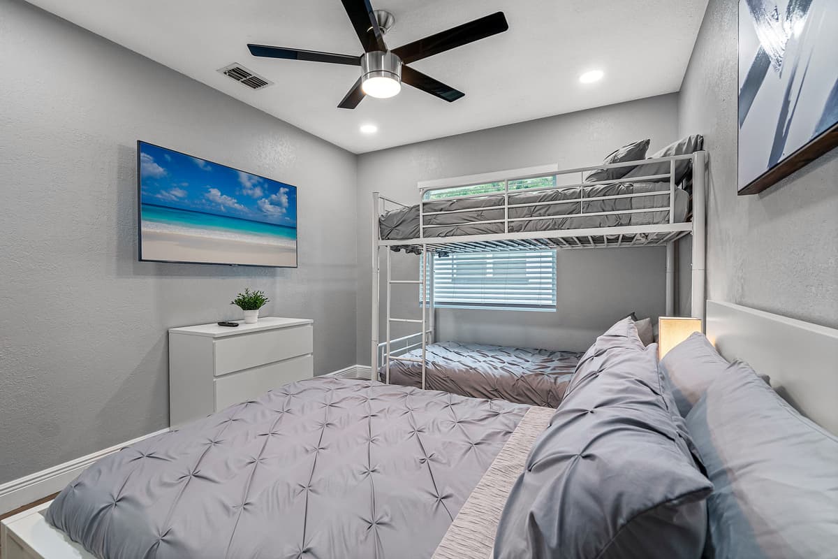 This impeccable room is great for kids who loves sleepovers or for small families who has small kids. It has a twin sized bed, bunkbed, drawers for storage and its own smart TV.