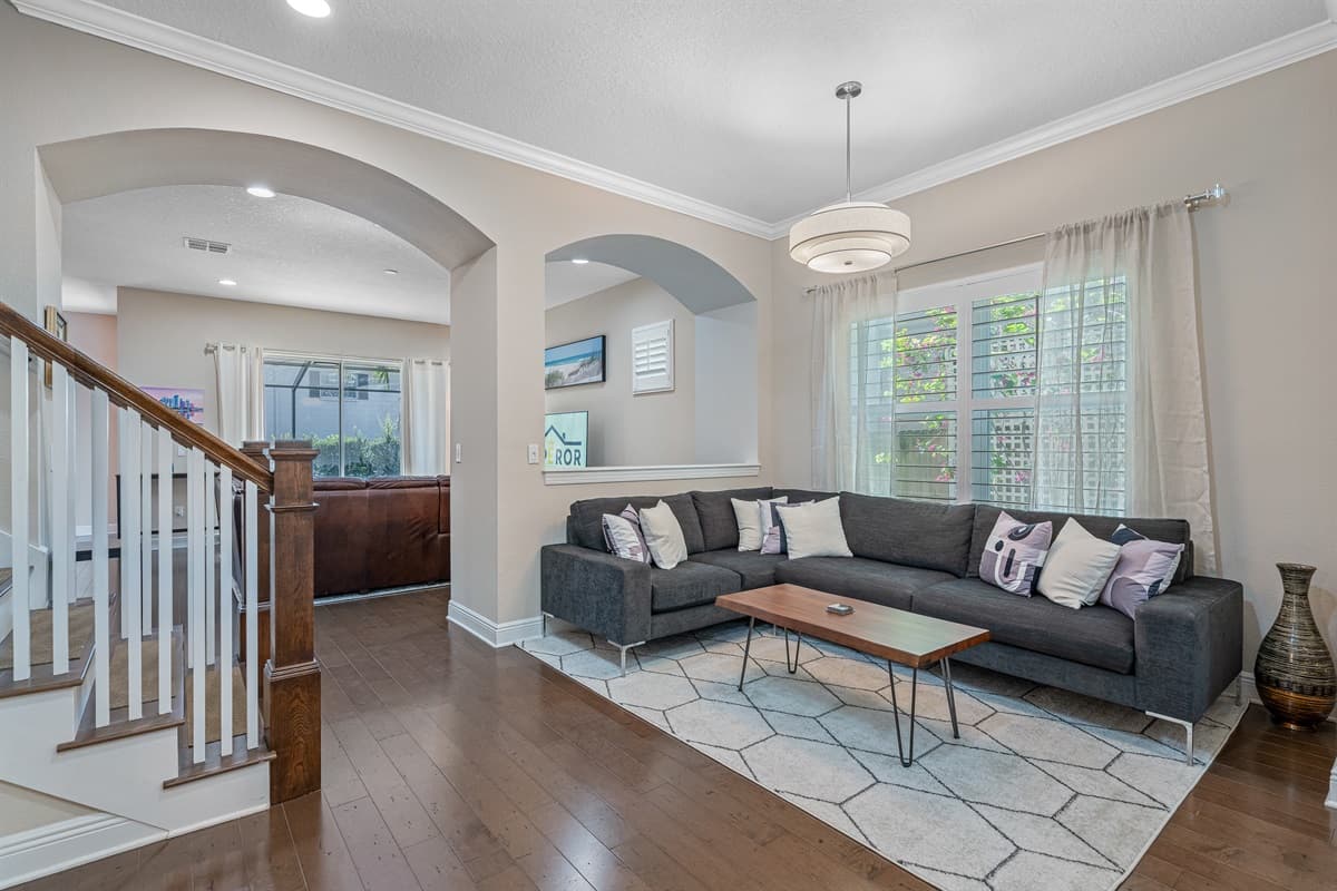Our stunning living area with high ceilings will welcome you once you enter the property. It has a gorgeous sofa set where you can chill and share great memories with family and friends. Send us  message for more information!