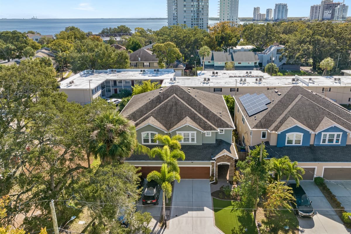 Aerial front view of our beautiful house showcasing our beautiful surroundings. The property is surrounded by trees and is fully fenced. If you are interested in this property, send us an inquiry as soon as possible.