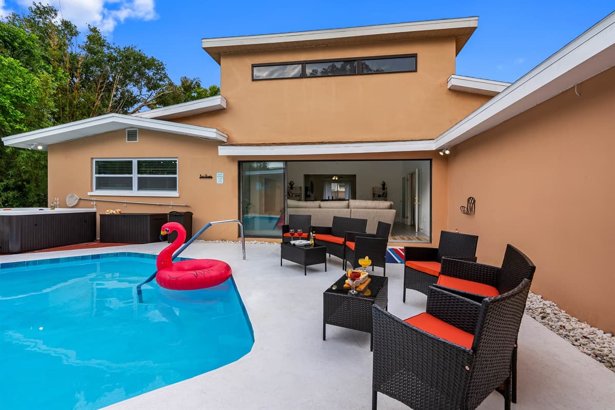 Make a splash with the whole family in the oversized pool, then dry off with snacks under the shady umbrella.