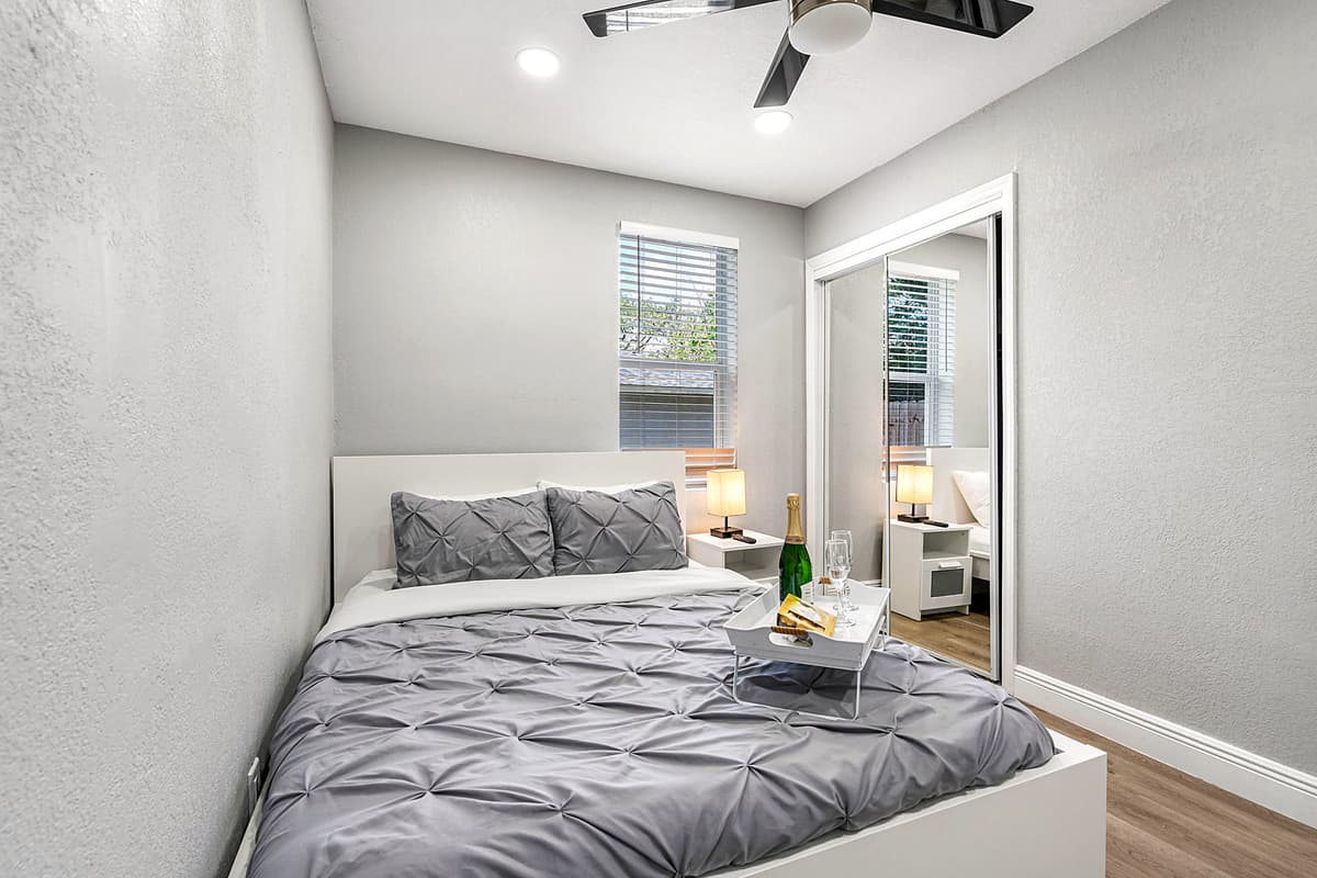The room features elegant decor, blending modern luxury with a cozy ambiance.