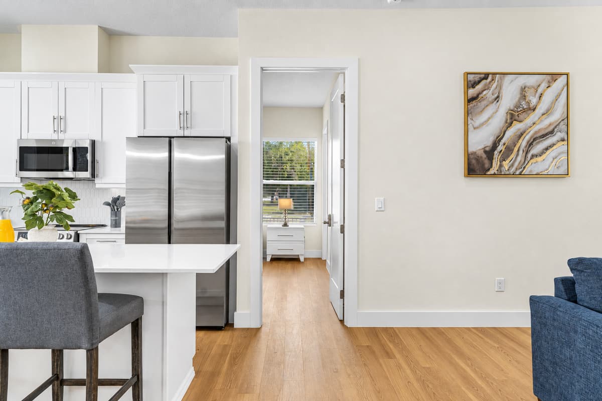 Kitchen with breakfast bar seating and easy access to adjacent living spaces.