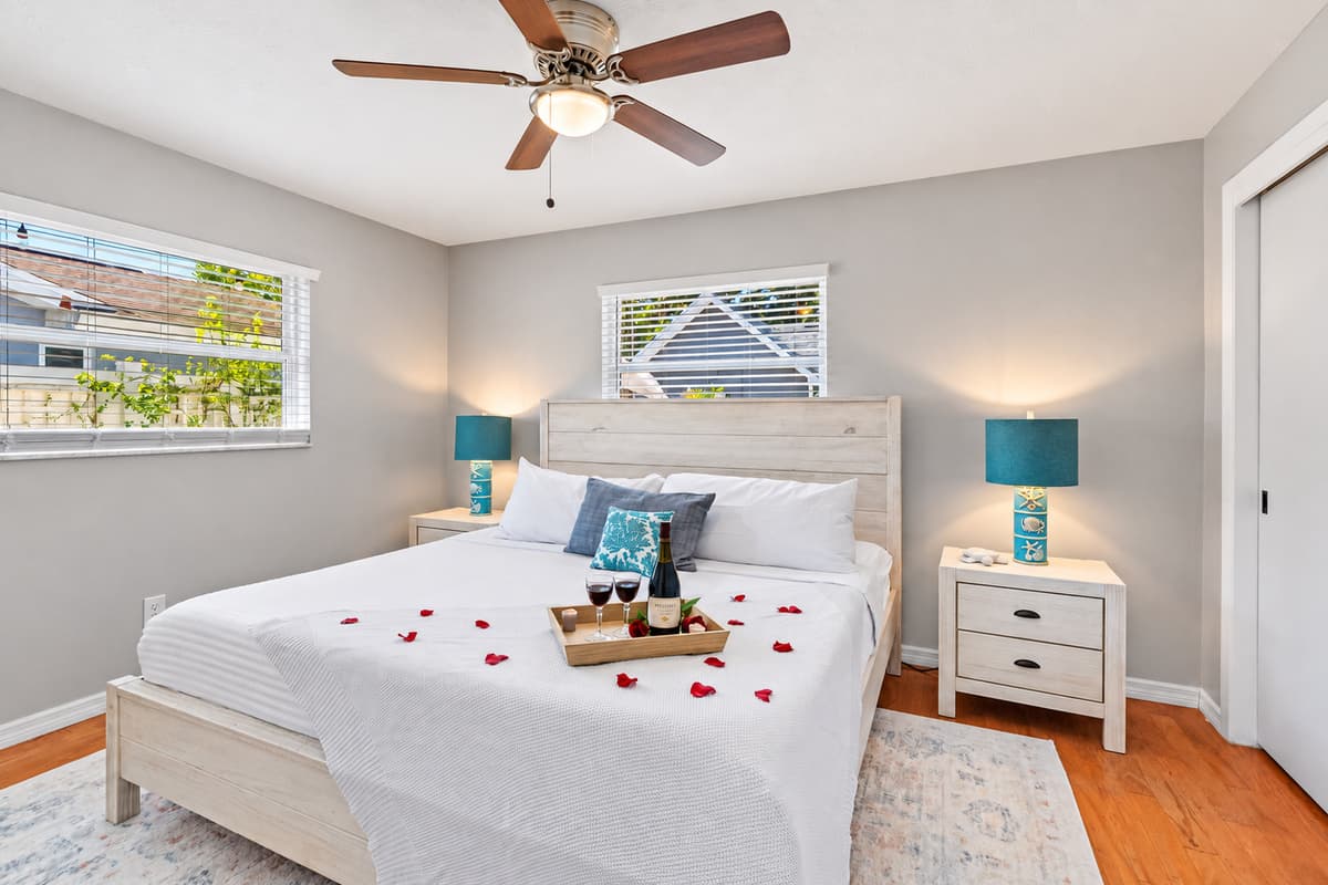 Designed for rest and rejuvenation, the master suite offers a luxury king bed, blackout blinds, and tasteful decor.