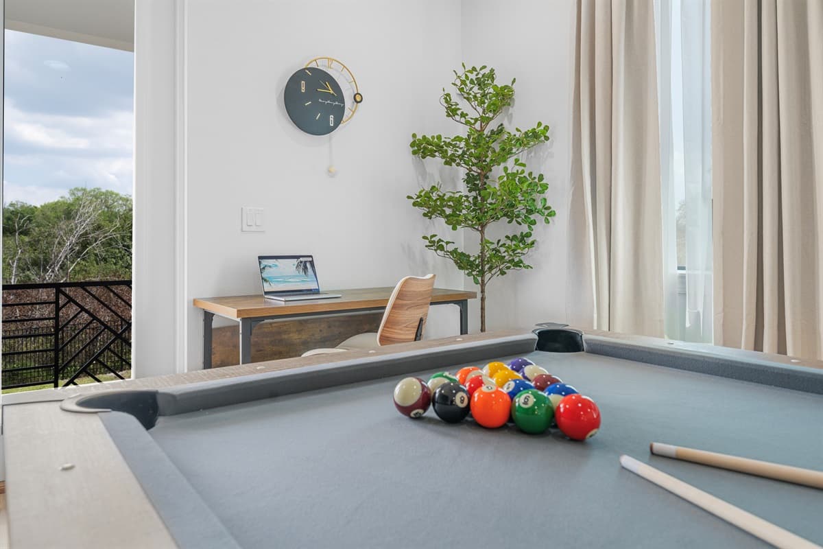 Close-up of the pool table setup, perfect for friendly games and indoor entertainment.