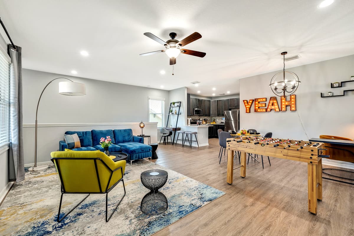 Our game room, adorned with a classic football table, invites you to experience the thrill of play and the joy of friendly competition.