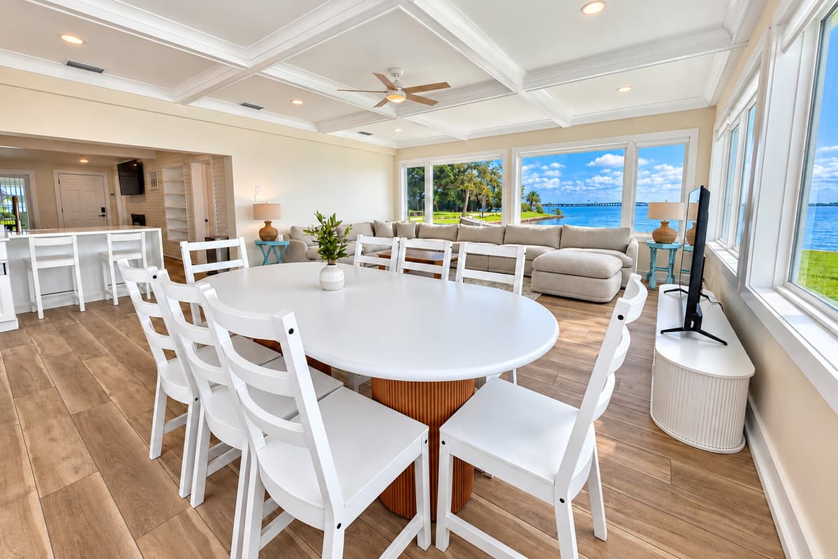Indoor dining area beside the waterfront windows.