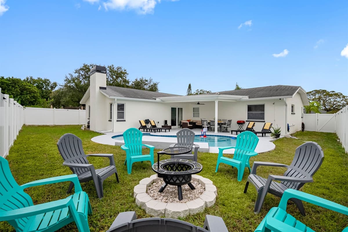 Make the most of every moment with poolside lounging by day and fireside conversations by night. This backyard offers the perfect balance of leisure and entertainment.