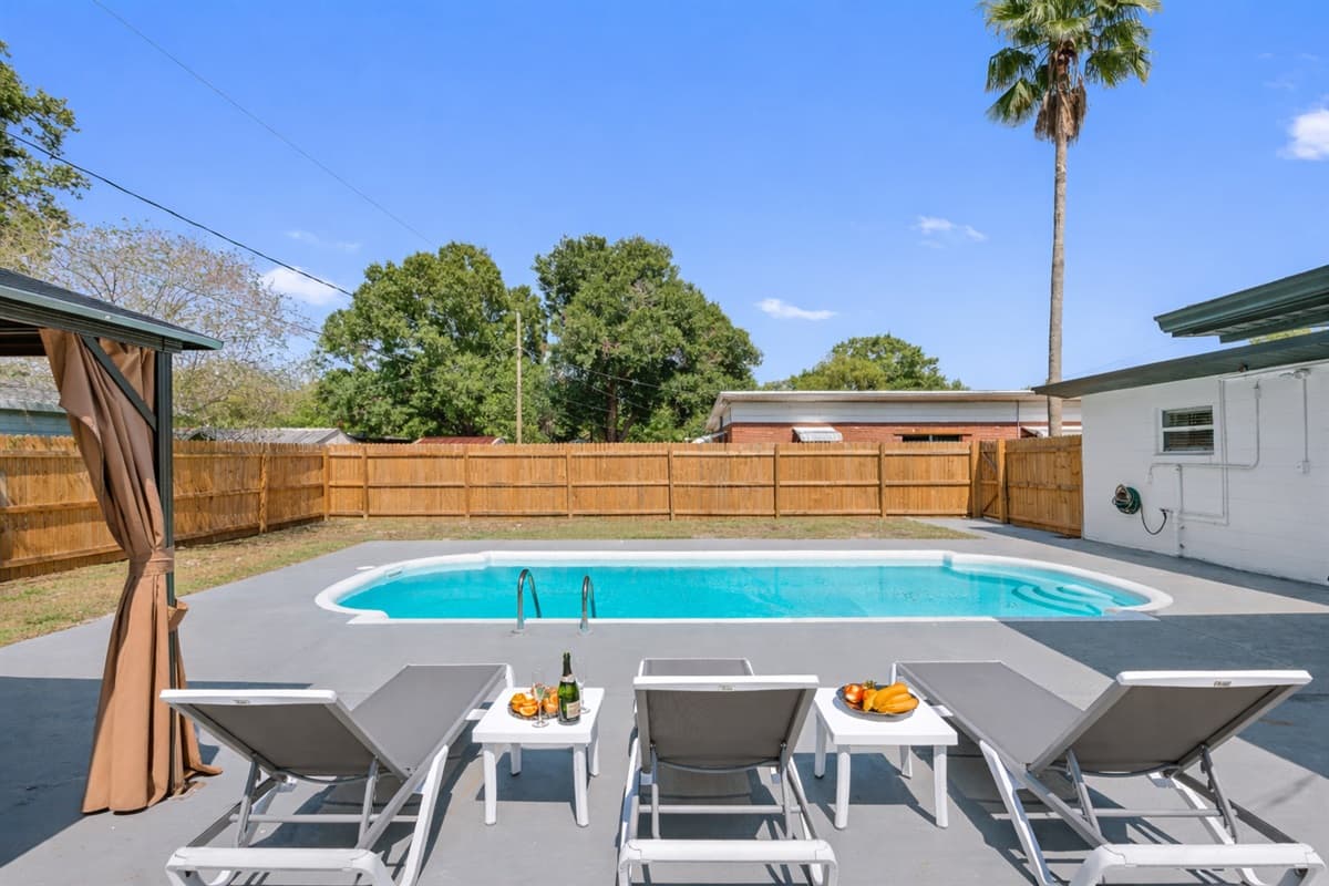 Step outside into the enchanting outdoor common space by the pool, where relaxation and leisure await you.