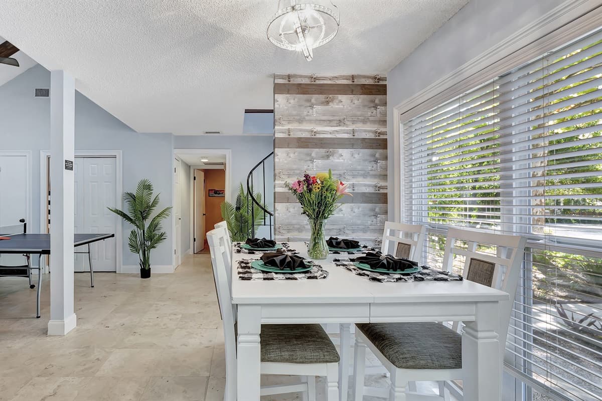 Gather around and savor the flavors of togetherness in our charming dining area!
