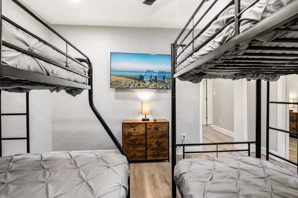 New setup for this bedroom: 1 queen bed and 1 bunk bed (twin over twin). New photos coming soon!