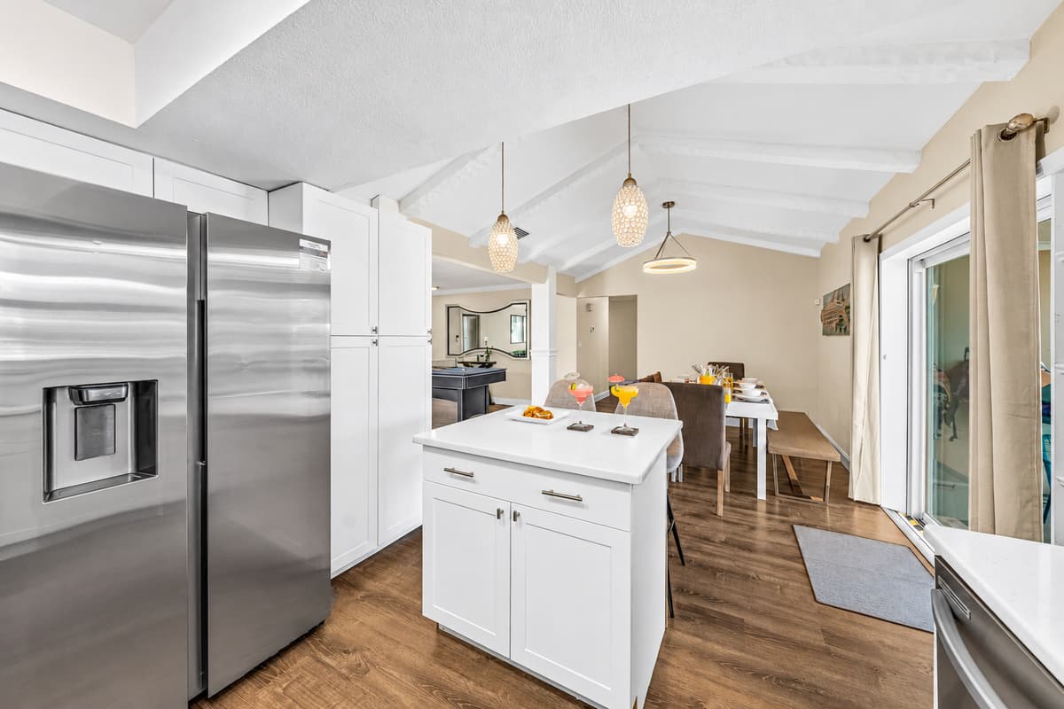 Bright and airy kitchen with a large island, perfect for family meals and entertaining.