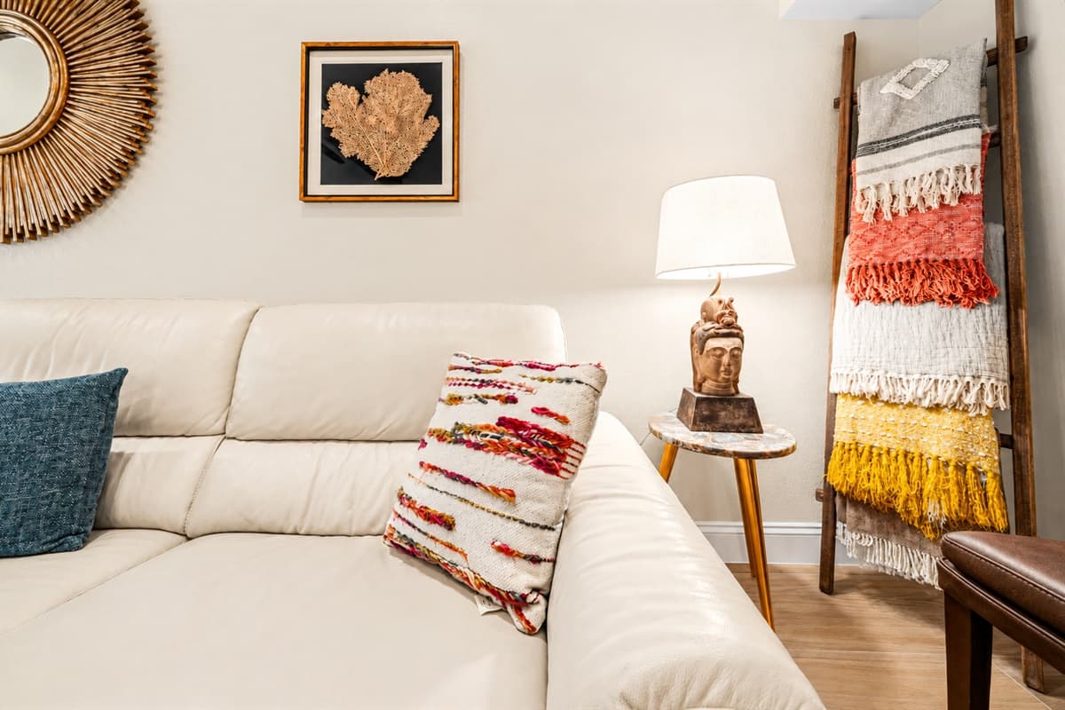 Cozy living room detail showcasing stylish décor, comfortable seating, and elegant accent touches throughout the space.