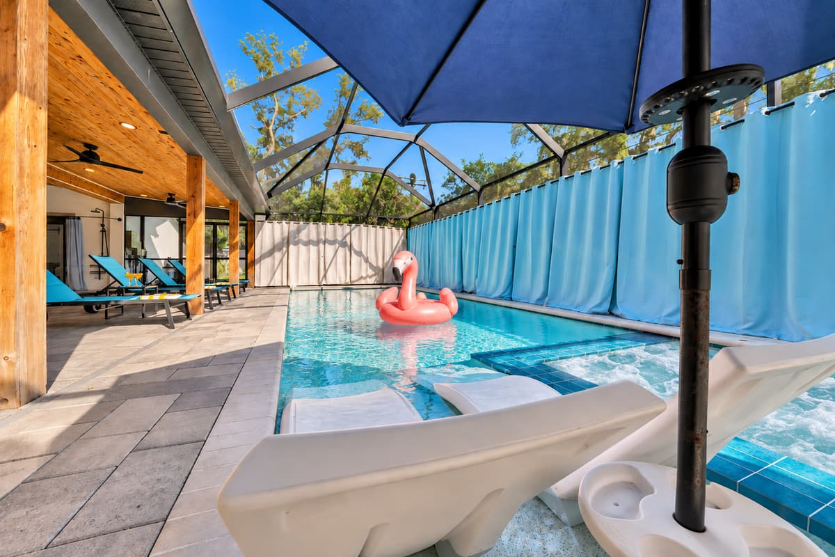 Shade, water and a bar cart's walk from the grill.
