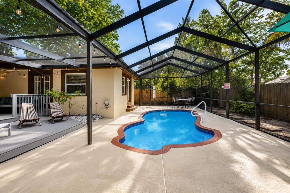 Spacious screened pool area perfect for relaxing, swimming, and enjoying the Florida sunshine.