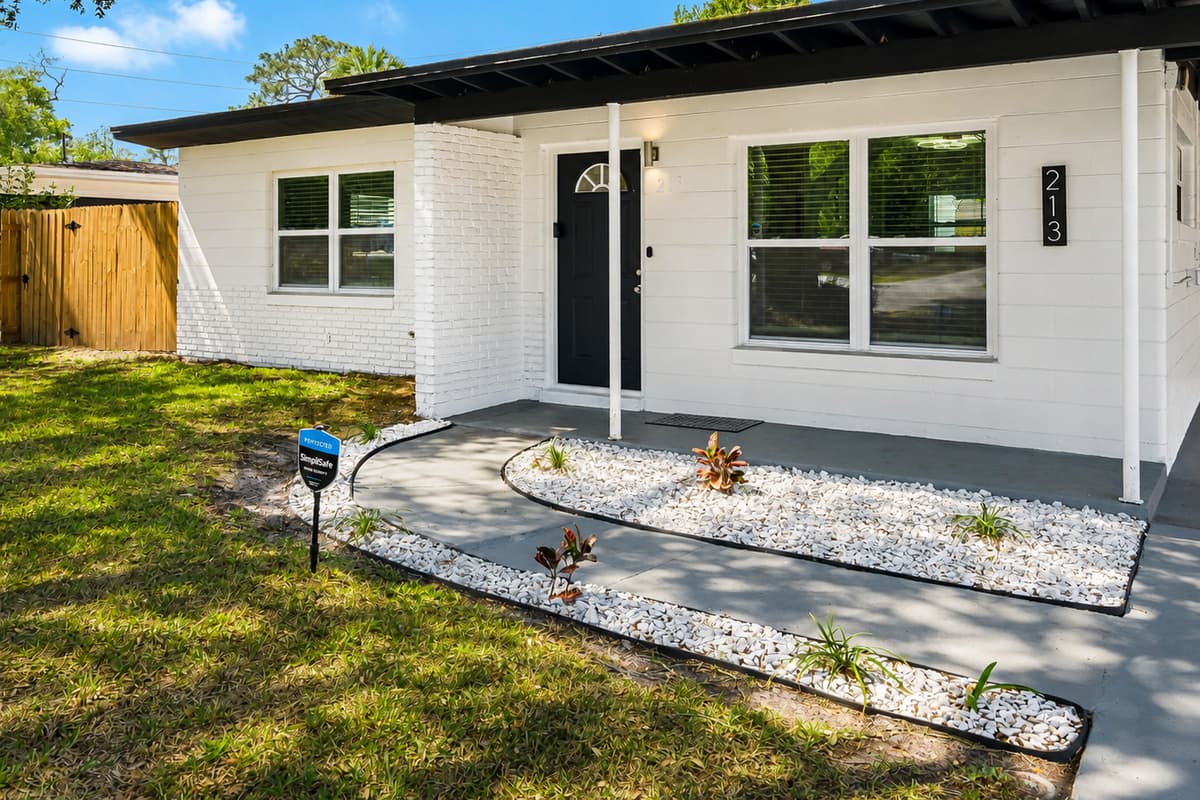 The entrance to our house is more than just a doorway - it's a grand introduction to the luxurious and comfortable living space that awaits you inside.