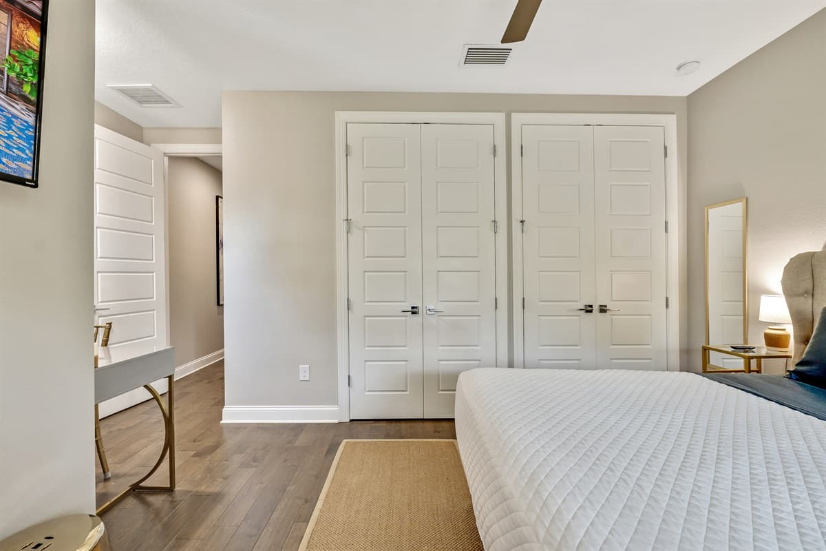 Adjacent to the sleeping area, you'll find a spacious closet, providing ample storage for your wardrobe and personal belongings.