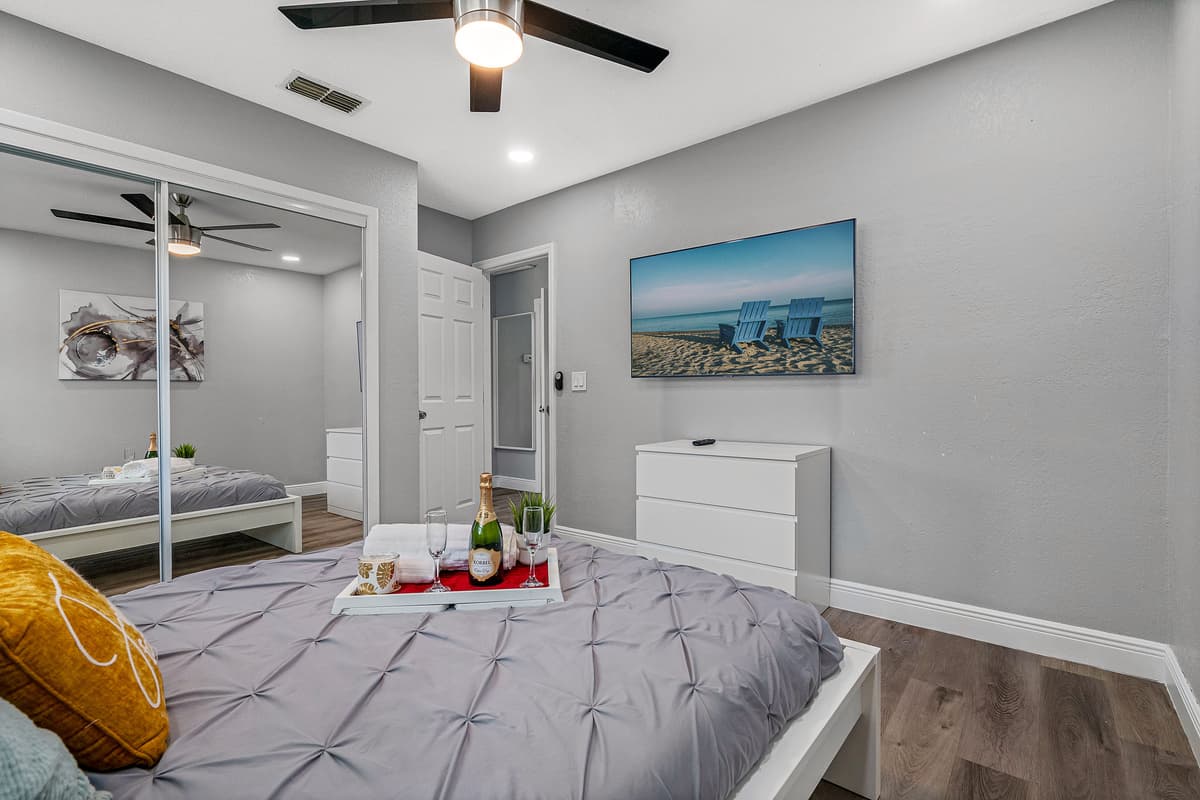 Enjoy the comfort while staying at your home far from home. This lovely bedroom has a queen size bed, smart TV, drawers and a full sized mirror closet..