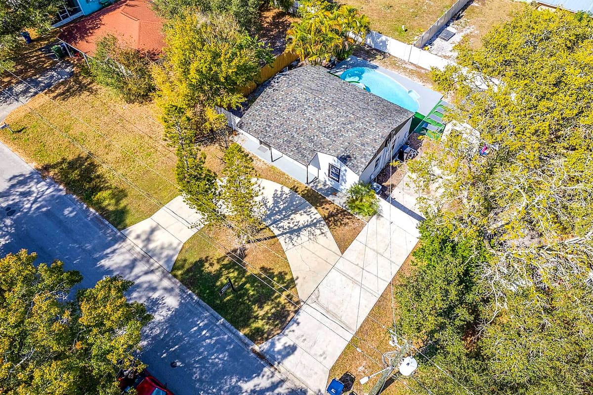 Aerial front view of the house showcasing the lovely driveway where you can park