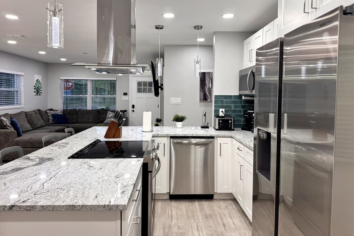 Inside, you’ll find a comprehensive selection of cookware, utensils, and dinnerware, including pots, pans, knives, and baking sheets, as well as plates, bowls, and glassware.