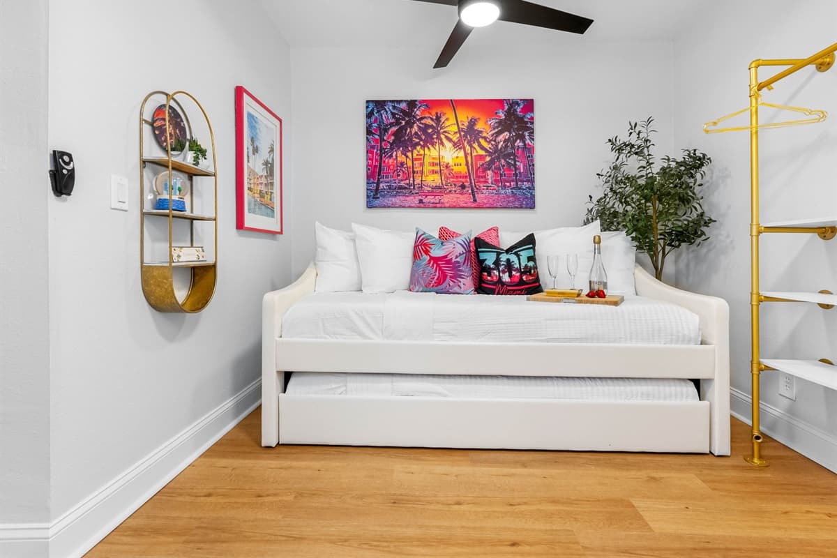 And for those looking for a shared coastal experience, Seaside Serenity has a common space adorned with a twin-size bed and a trundle for additional sleeping quarters.