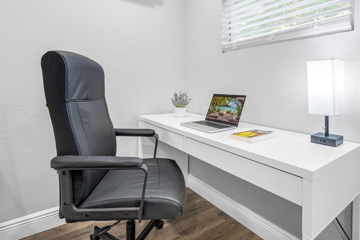 Designed with space efficiency and comfort in mind — complete with a desk area for work or study.