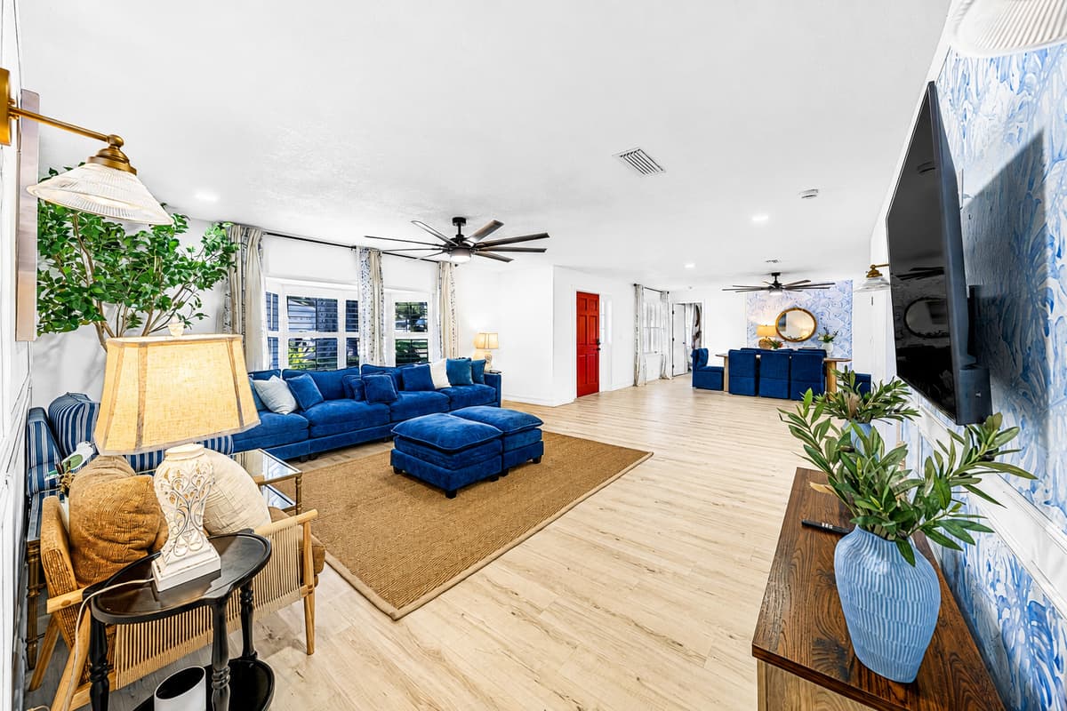 The living room opens straight into the rest of the house. Bedrooms one way, kitchen the other, nobody stuck in a corner.