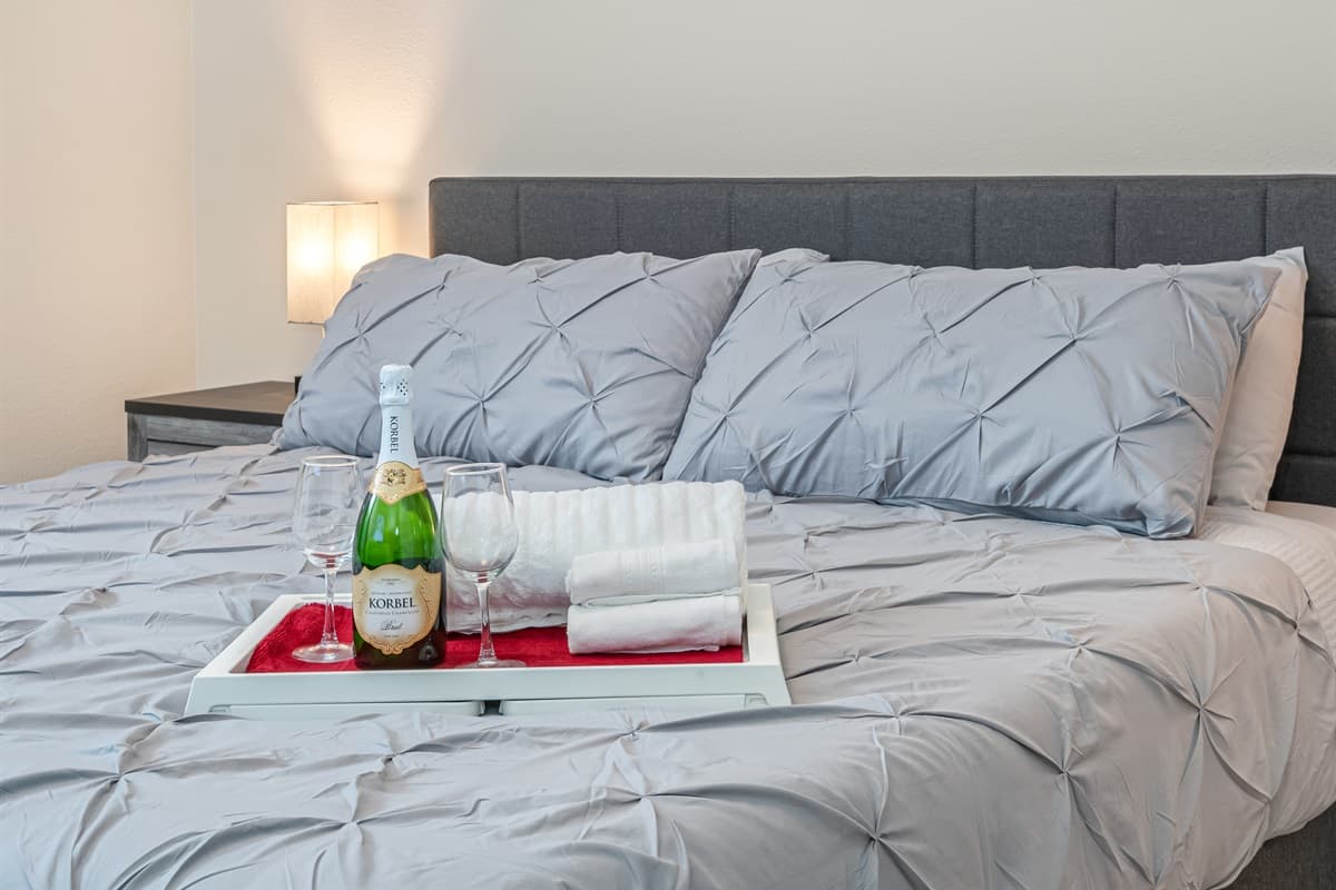 This spacious bedroom has a king  sized bed, smart TV, and drawers for storage. This bedroom will surely make your stay in this property the best among others. Please send us an inquiry as soon as possible!
