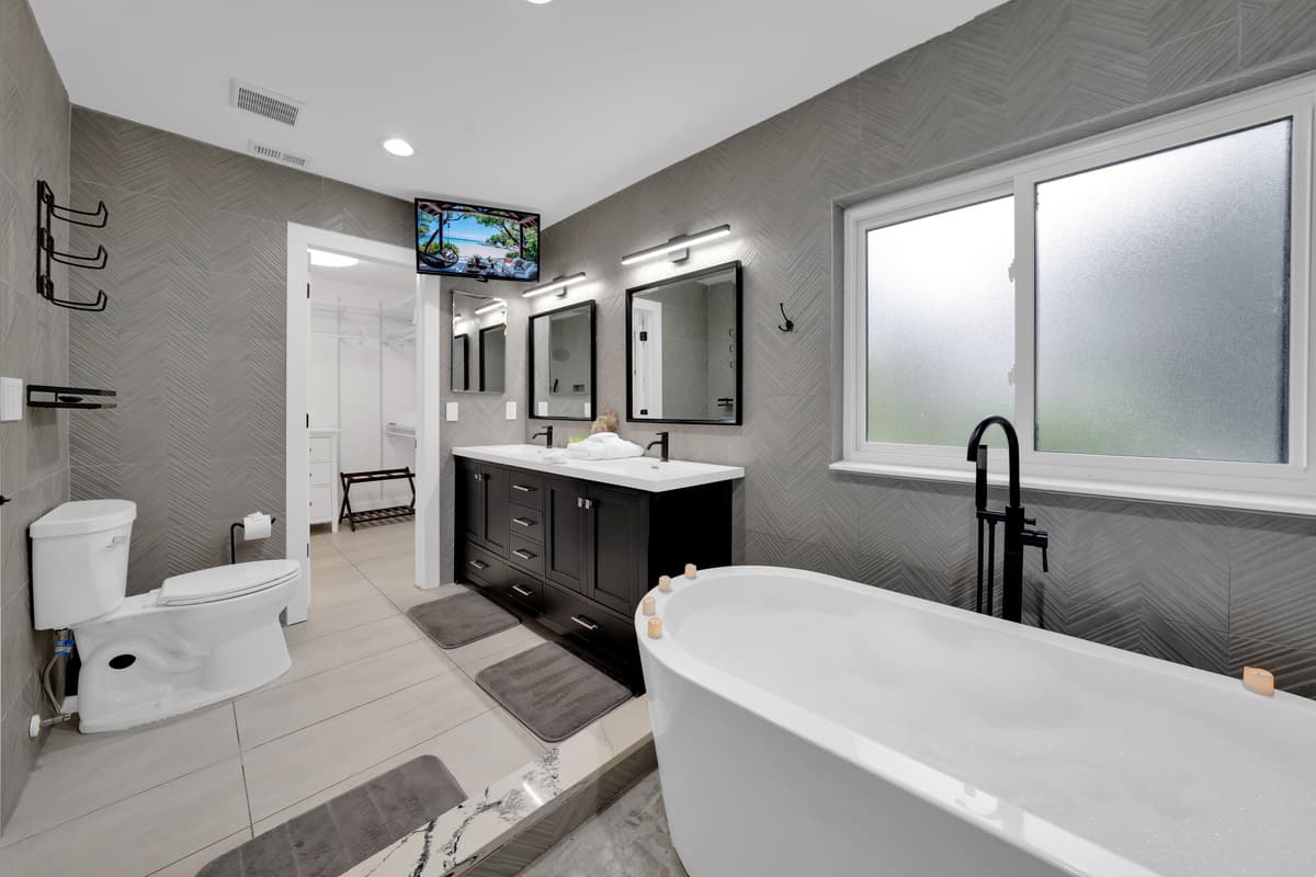 This bathroom feels more like a spa than a stop on the way to the pool.
