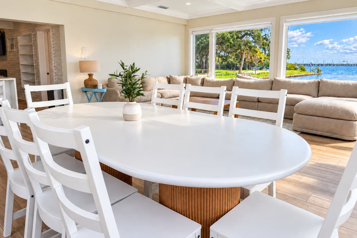 Indoor dining area beside the waterfront windows.