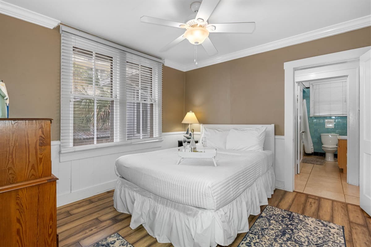 The cozy ambiance of this room is further accentuated by warm neutral tones, creating a calm and inviting environment that promotes relaxation.