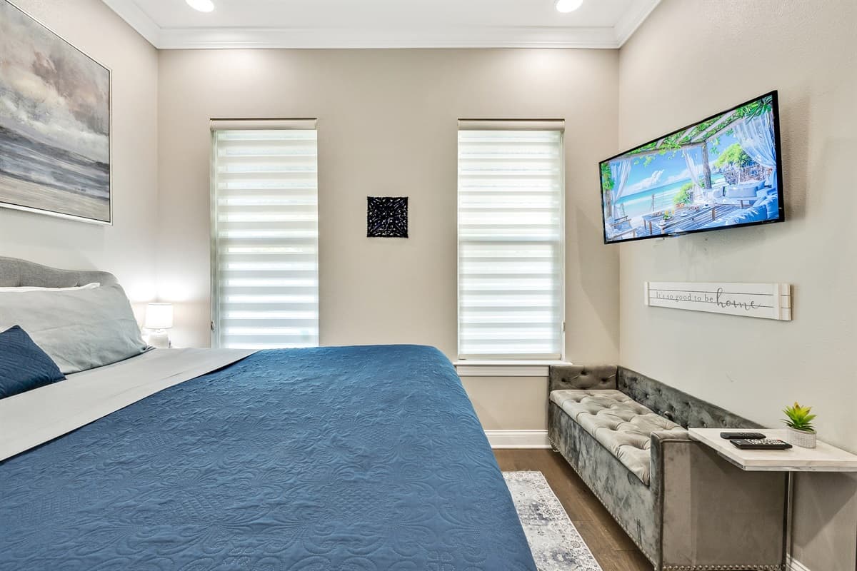 Experience the perfect blend of comfort and style as you unwind in the embrace of the queen-size bed and immerse yourself in the tranquil ambiance of this charming bedroom.