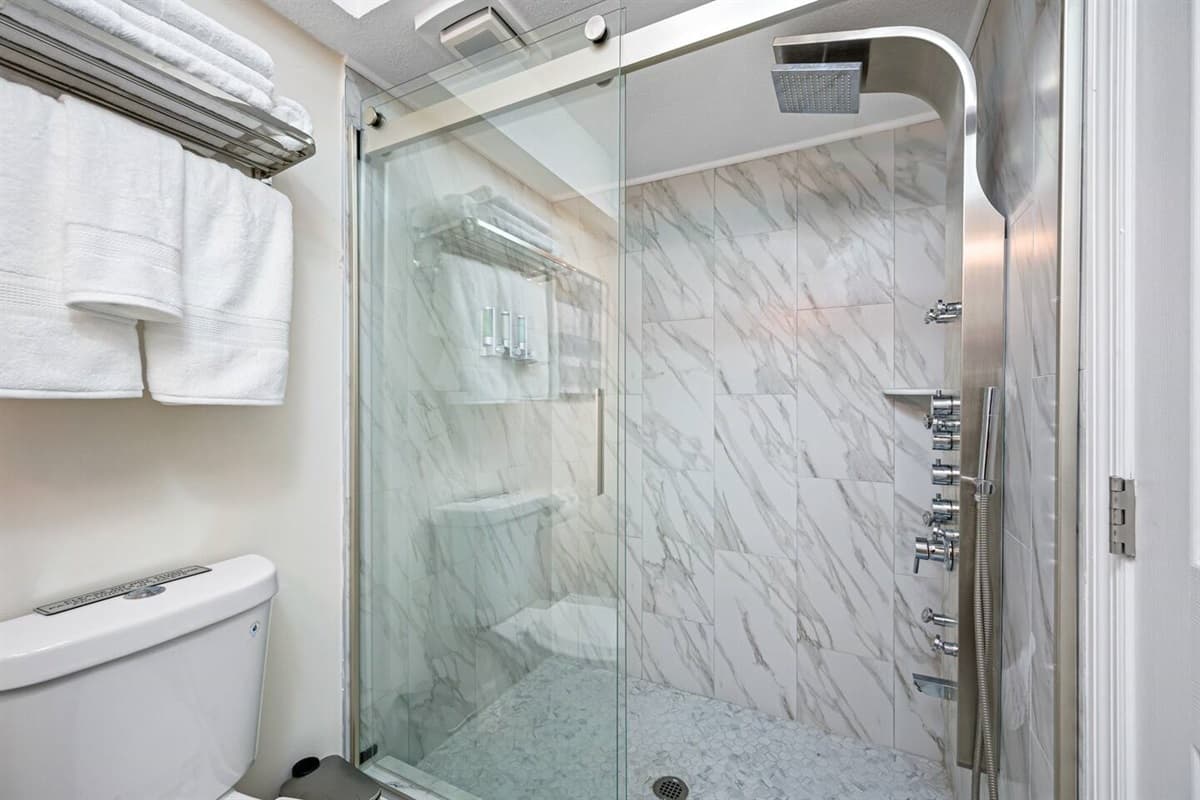 Great bathroom with toilet, sink, and walk-in shower. Feel fresh and clean after a long day of travel from your home to your home away from home. If you are interested in this property, send us an inquiry now!
