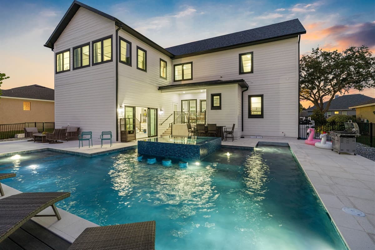 Enhancing the allure of this outdoor oasis is the inviting spa area, where you can relax and rejuvenate after a day of adventures.