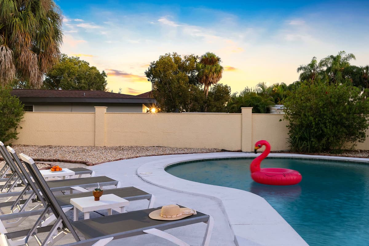 Find your calm by the water. This beautifully maintained backyard offers privacy, comfort, and all the space you need to unwind.